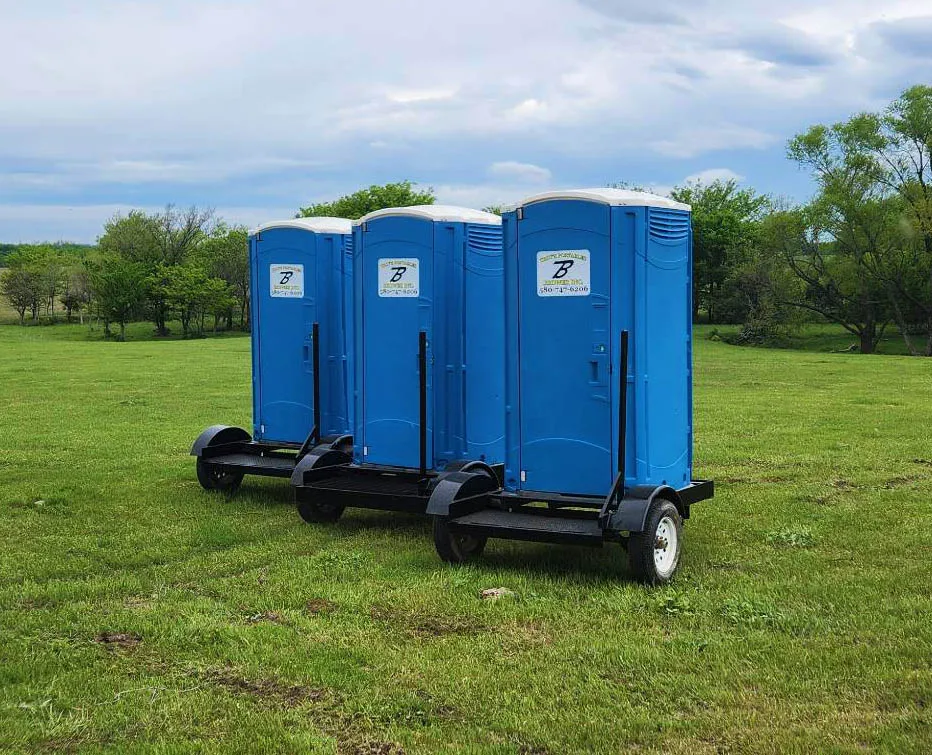 Brower Inc. ADA-compliant portable restroom trio mounted on trailer in Newkirk, Oklahoma